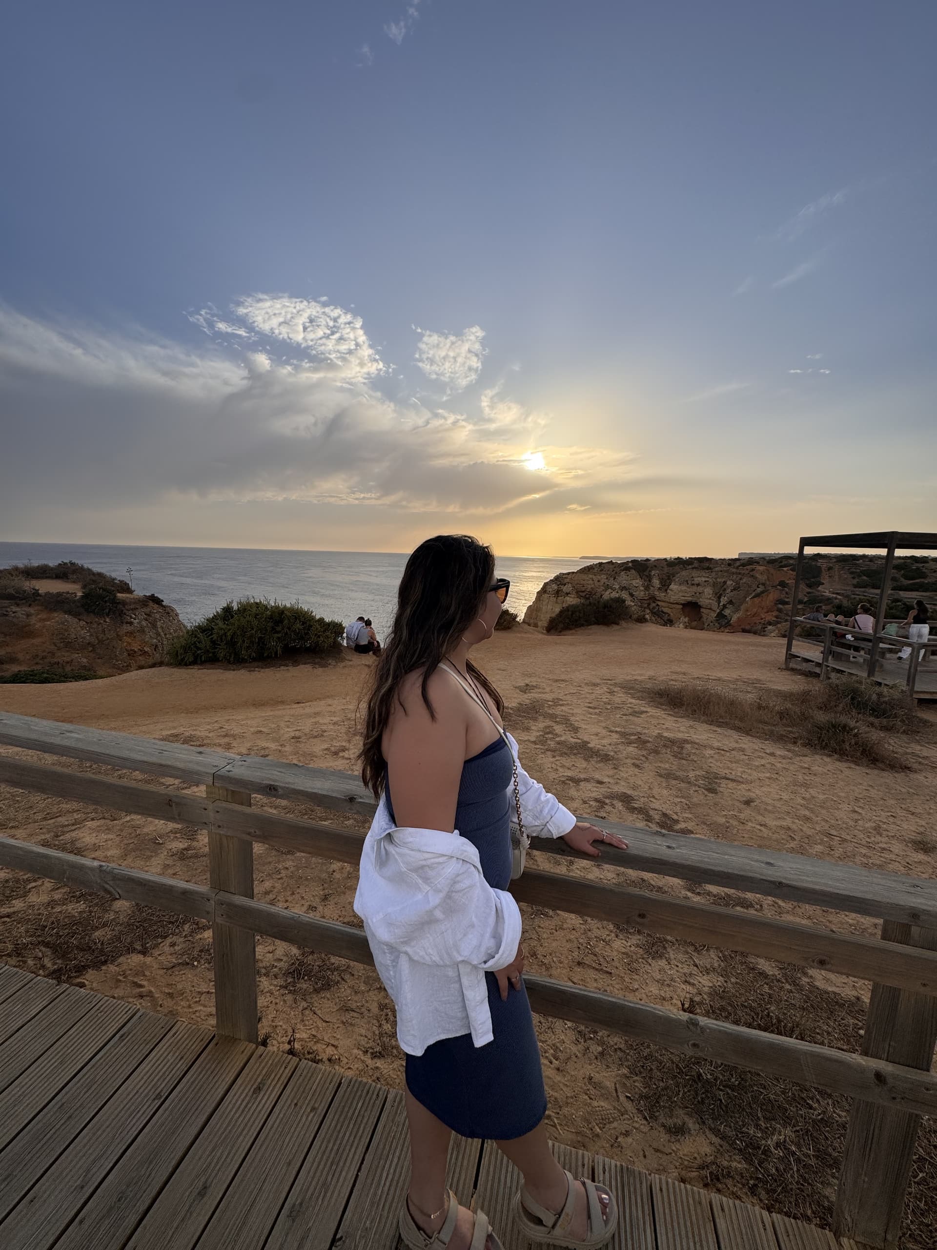 Garima Nagpal taking in a coastal sunset while travelling